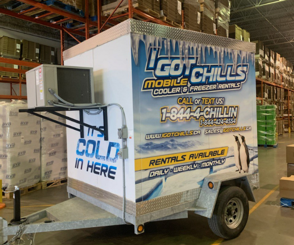 Mobile freezer trailer running inside a distribution warehouse