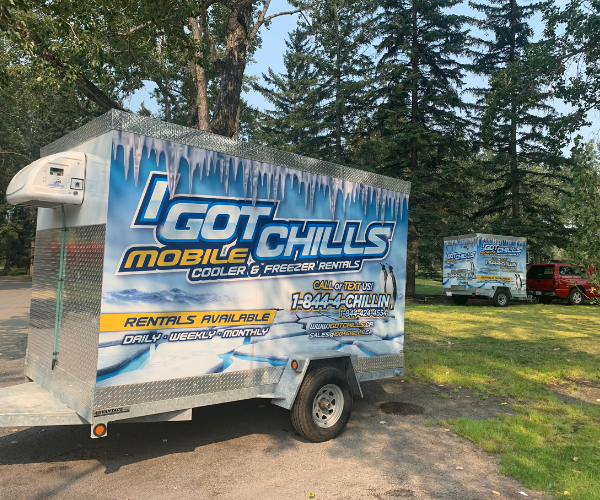 Two I Got Chills refrigerated trailers set up in a Calgary park